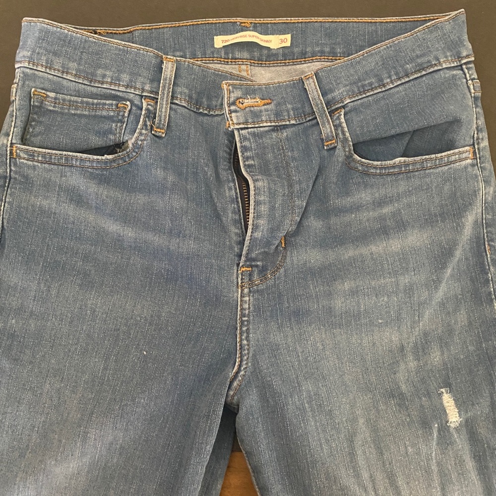 Levi’s 720 high-rise super skinny distressed jeans 30